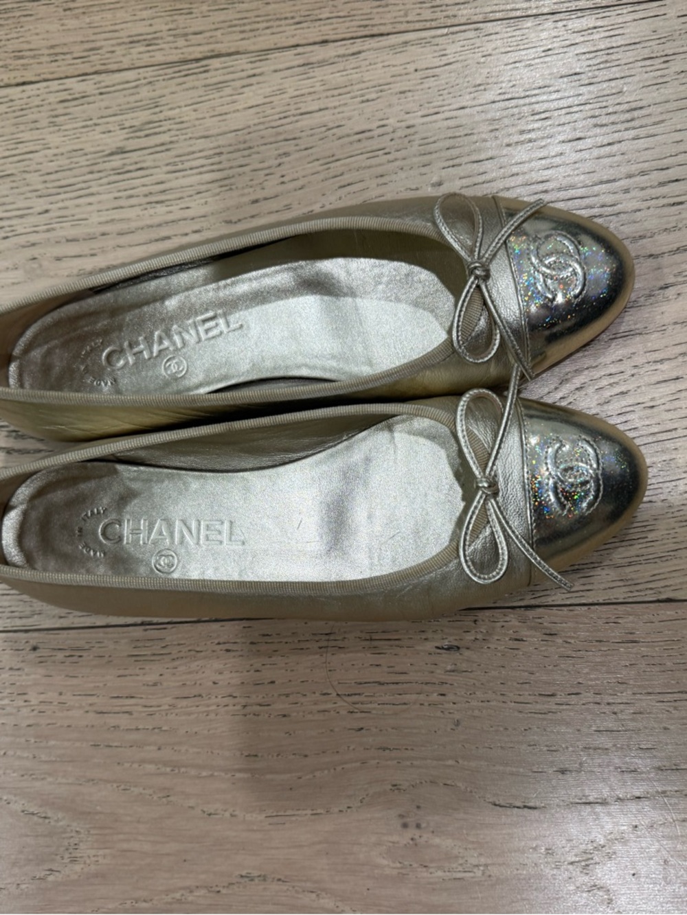 CHANEL Gold Leather Ballet Flats with Shimmer Cap-Toe